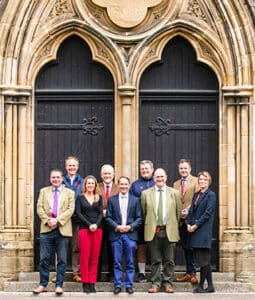 The Hurst Foundation team standing in front of the Hurst Chapel doors