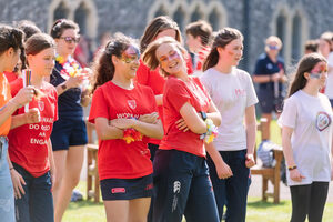 Girls in red T-shirts dancing