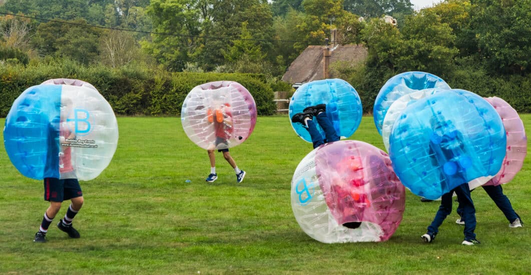 A photograph of pupils from Hurstpierpoint College engaging in a Belonging activity.